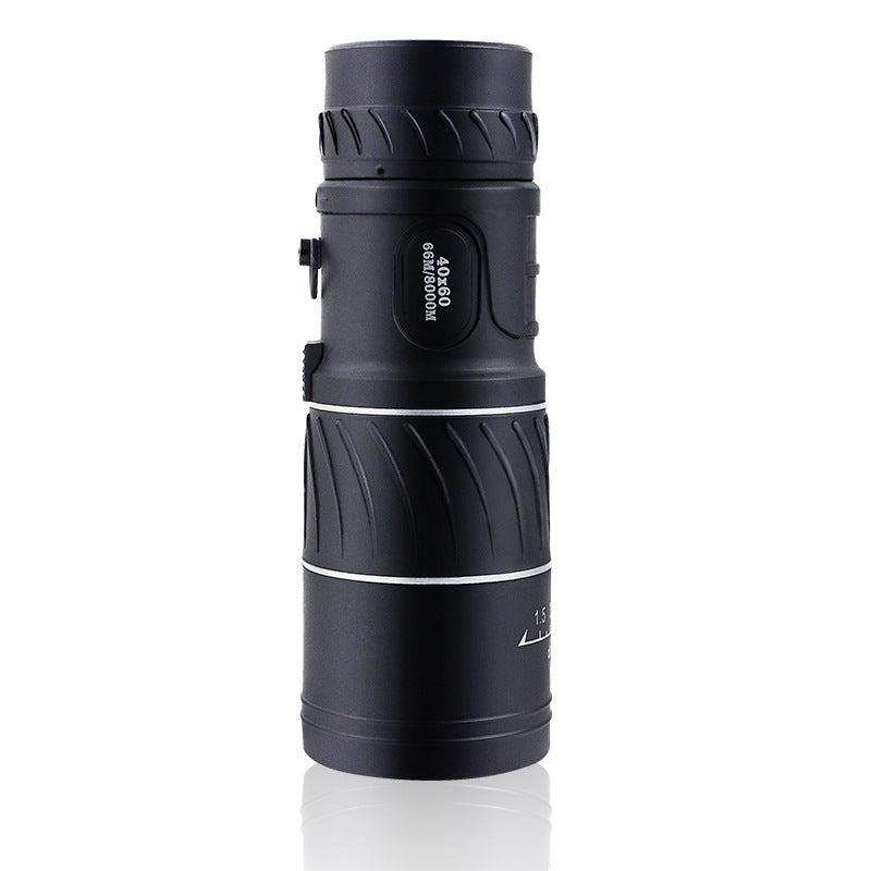 a black telescope with a white background