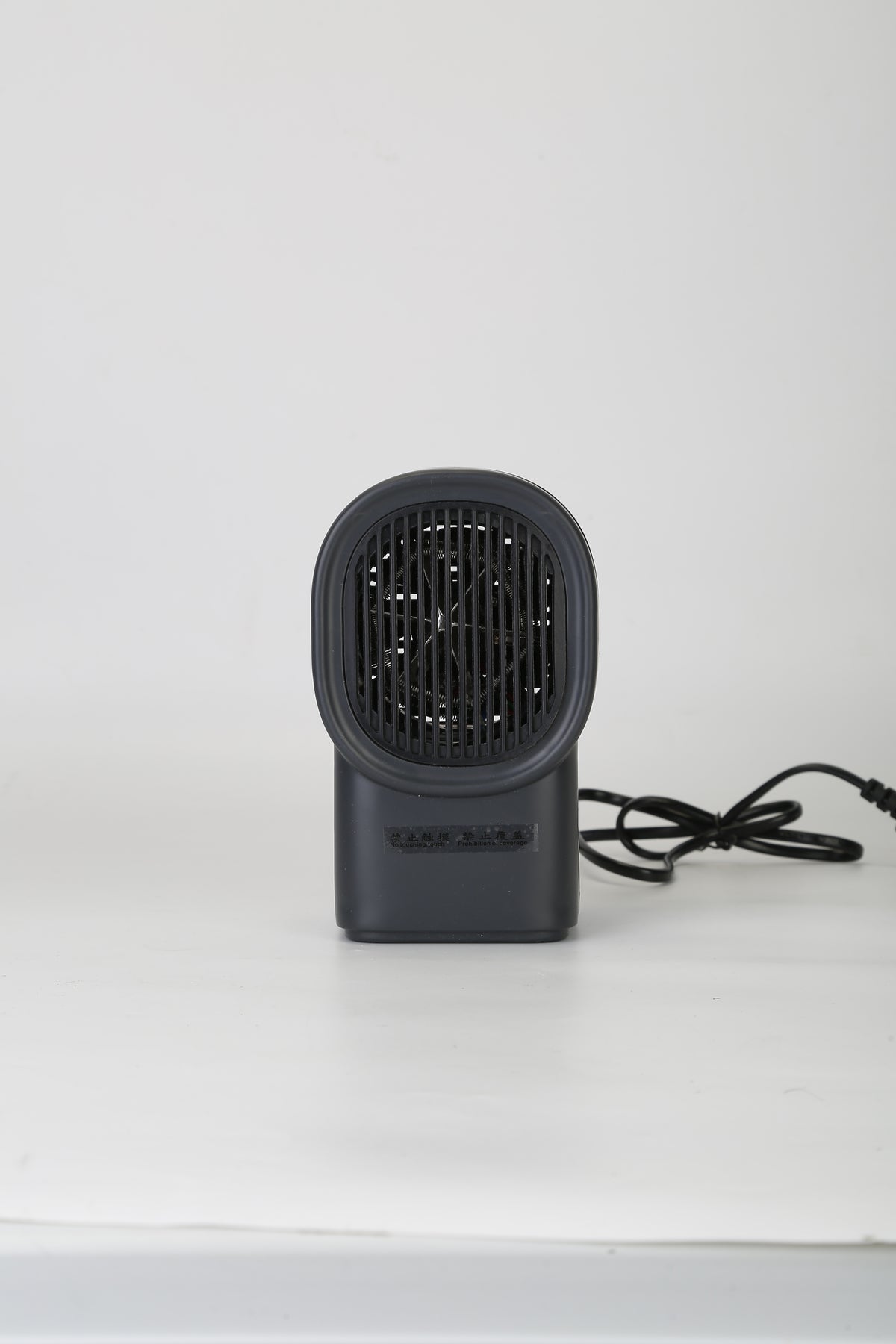 a black fan with a cord