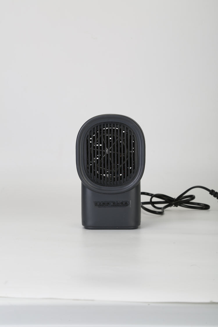 a black fan with a cord
