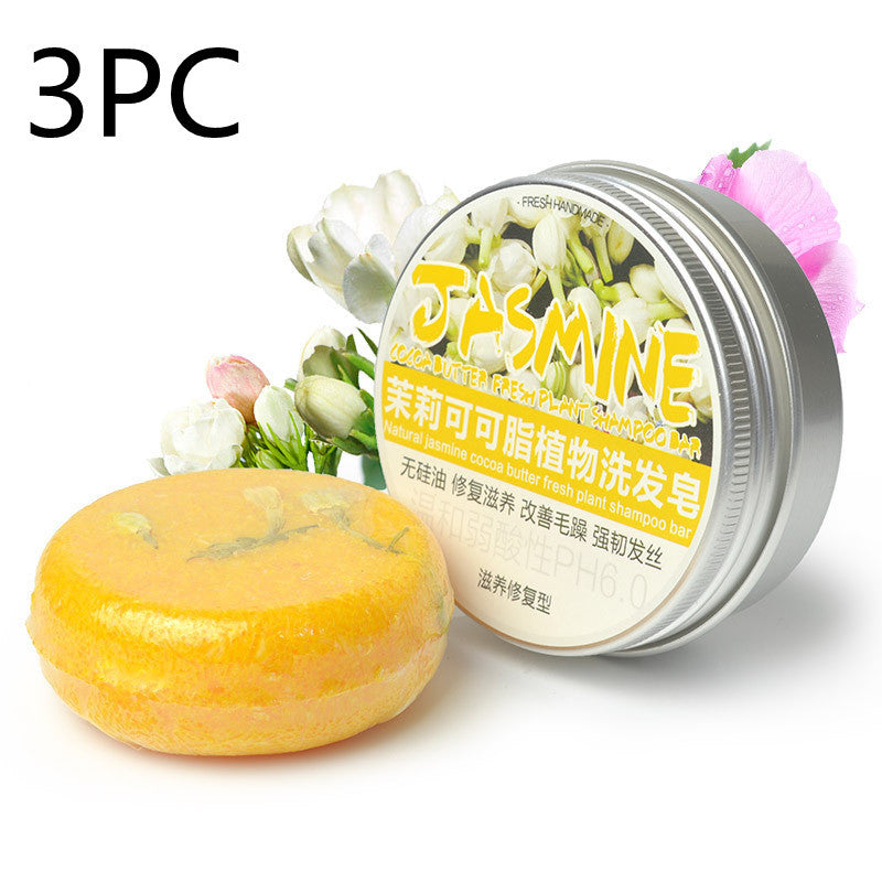 a jar of soap next to a round object