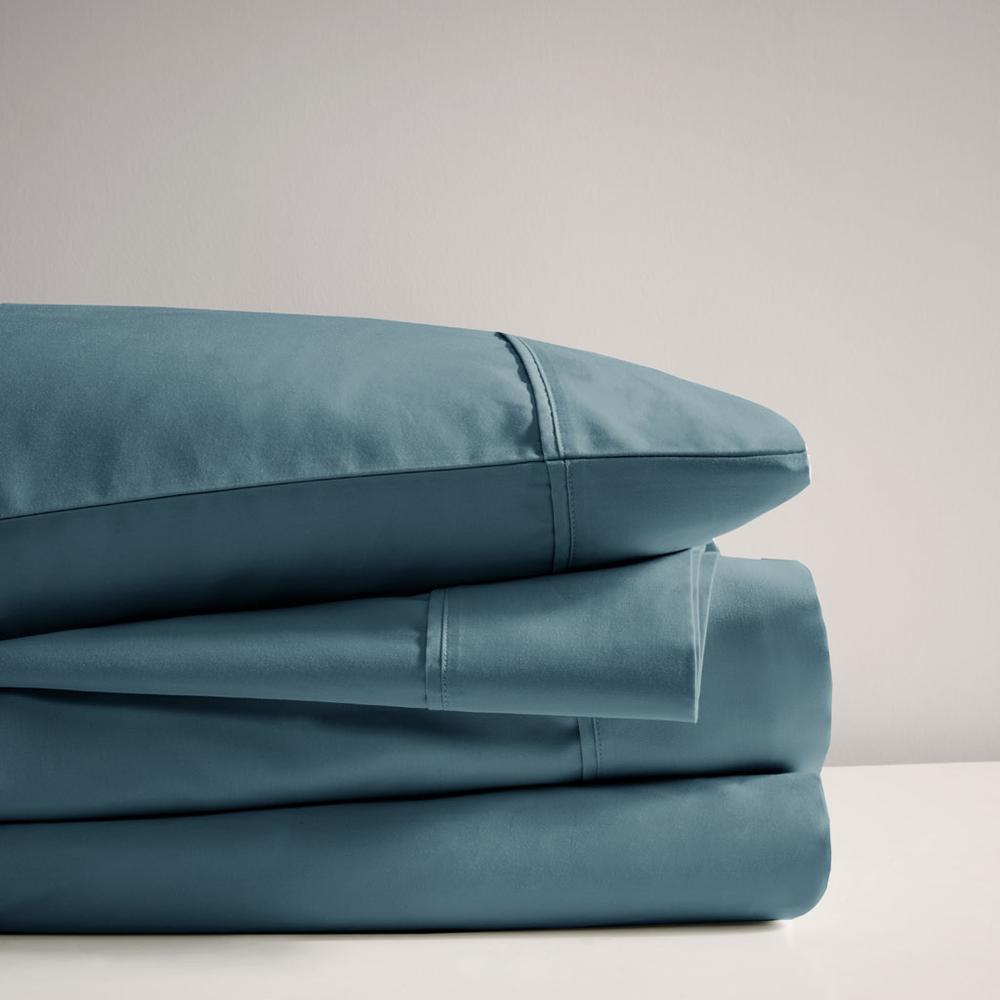 a stack of blue sheets