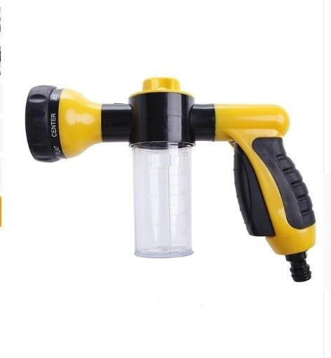 a yellow and black water spray gun