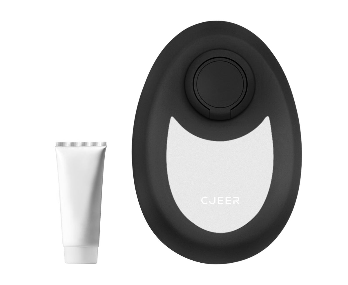 a black oval object with a white tube