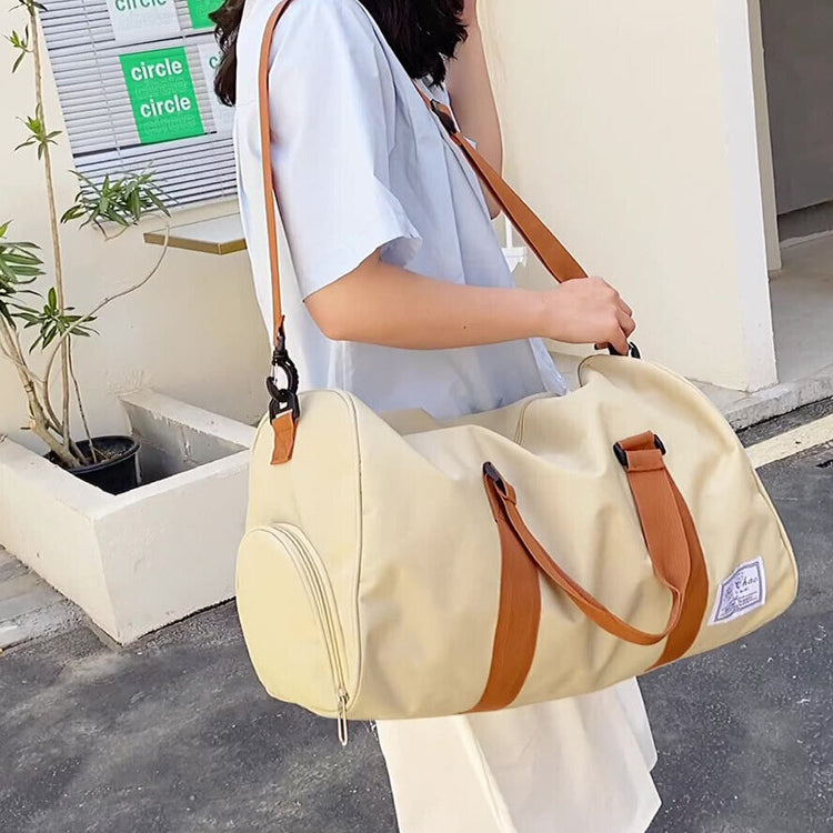 a woman carrying a bag