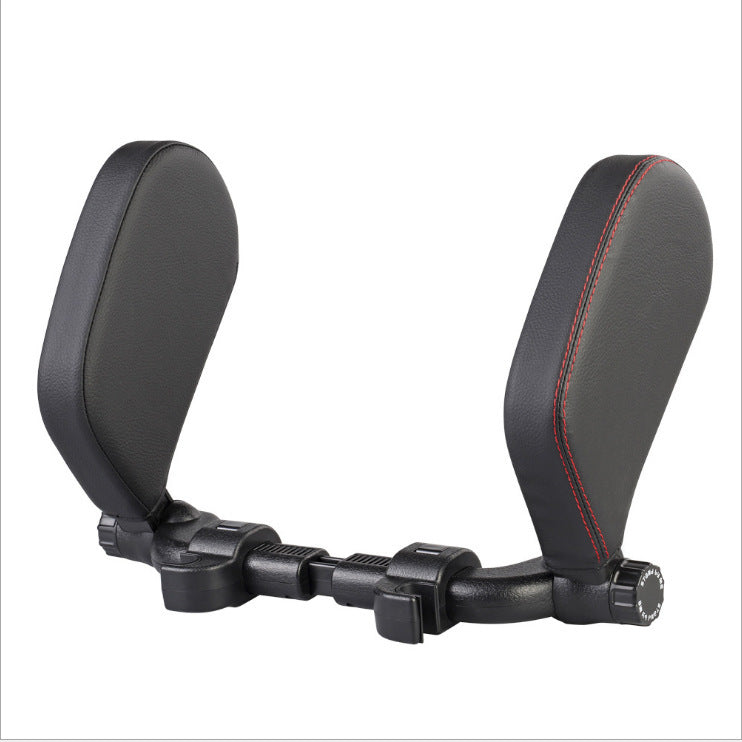 a black seat with red stitching