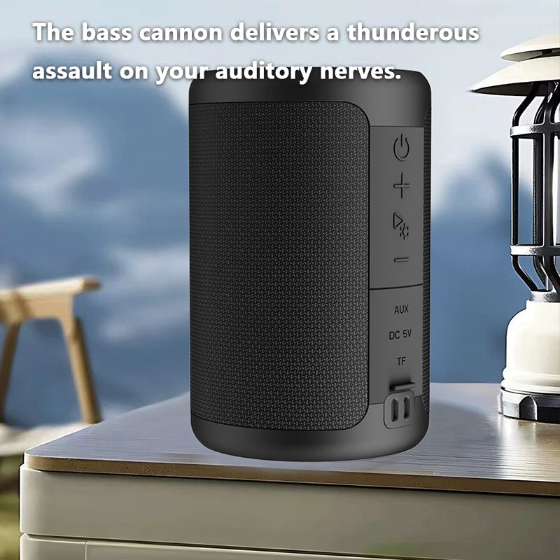 a black speaker on a table