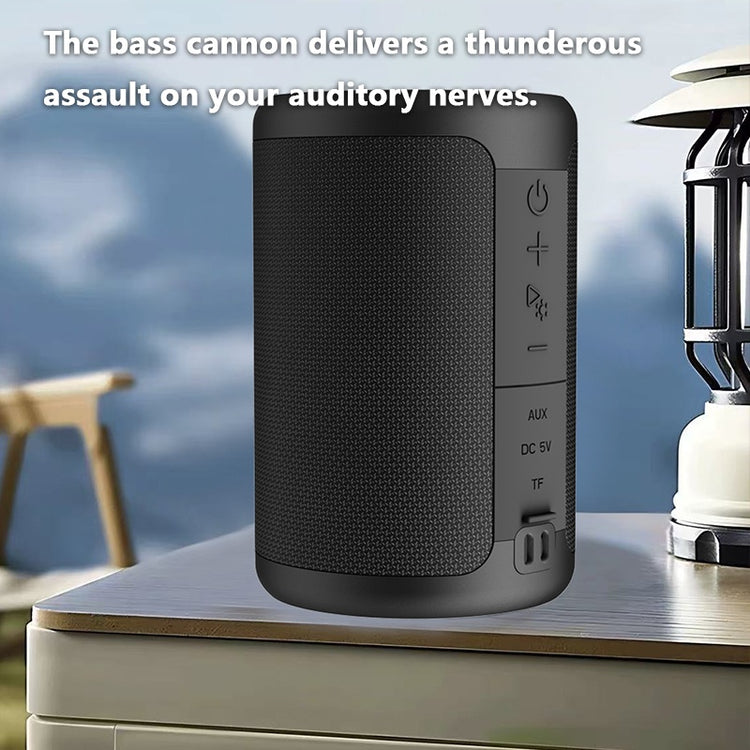 a black speaker on a table