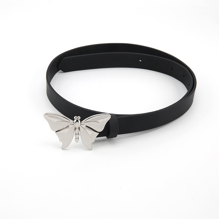 a black belt with a silver butterfly buckle