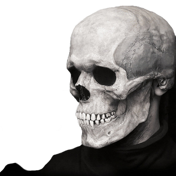 a person wearing a skull mask