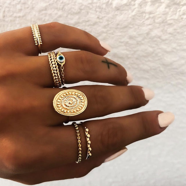 a hand with many rings