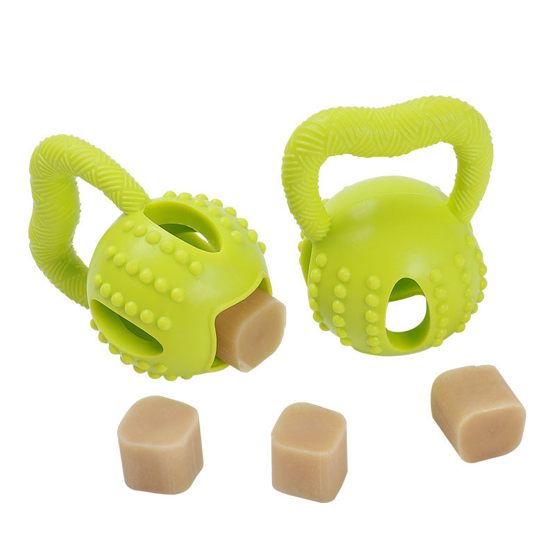 a green kettlebells with a couple of cubes