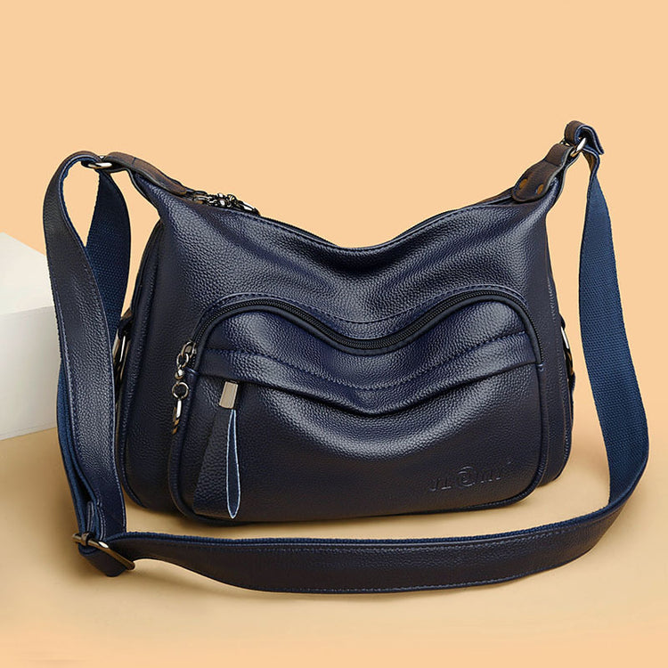 a black purse with a strap