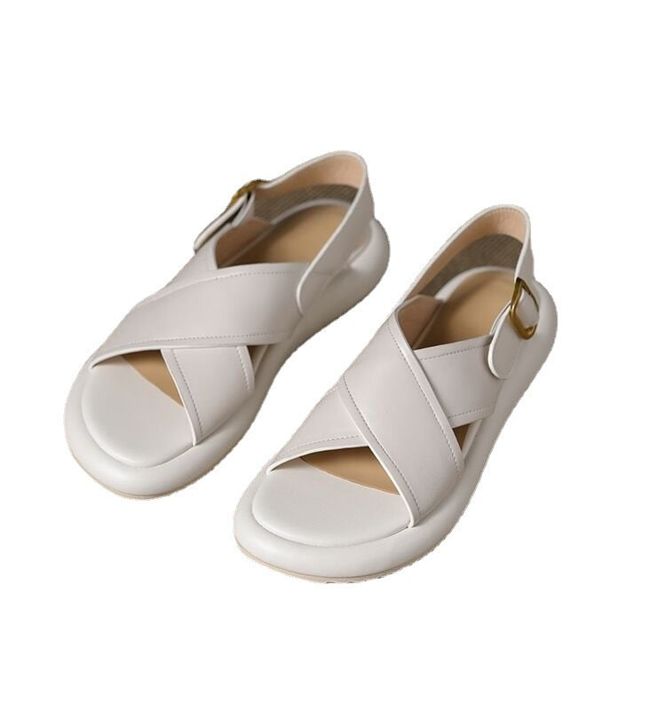 a pair of white sandals