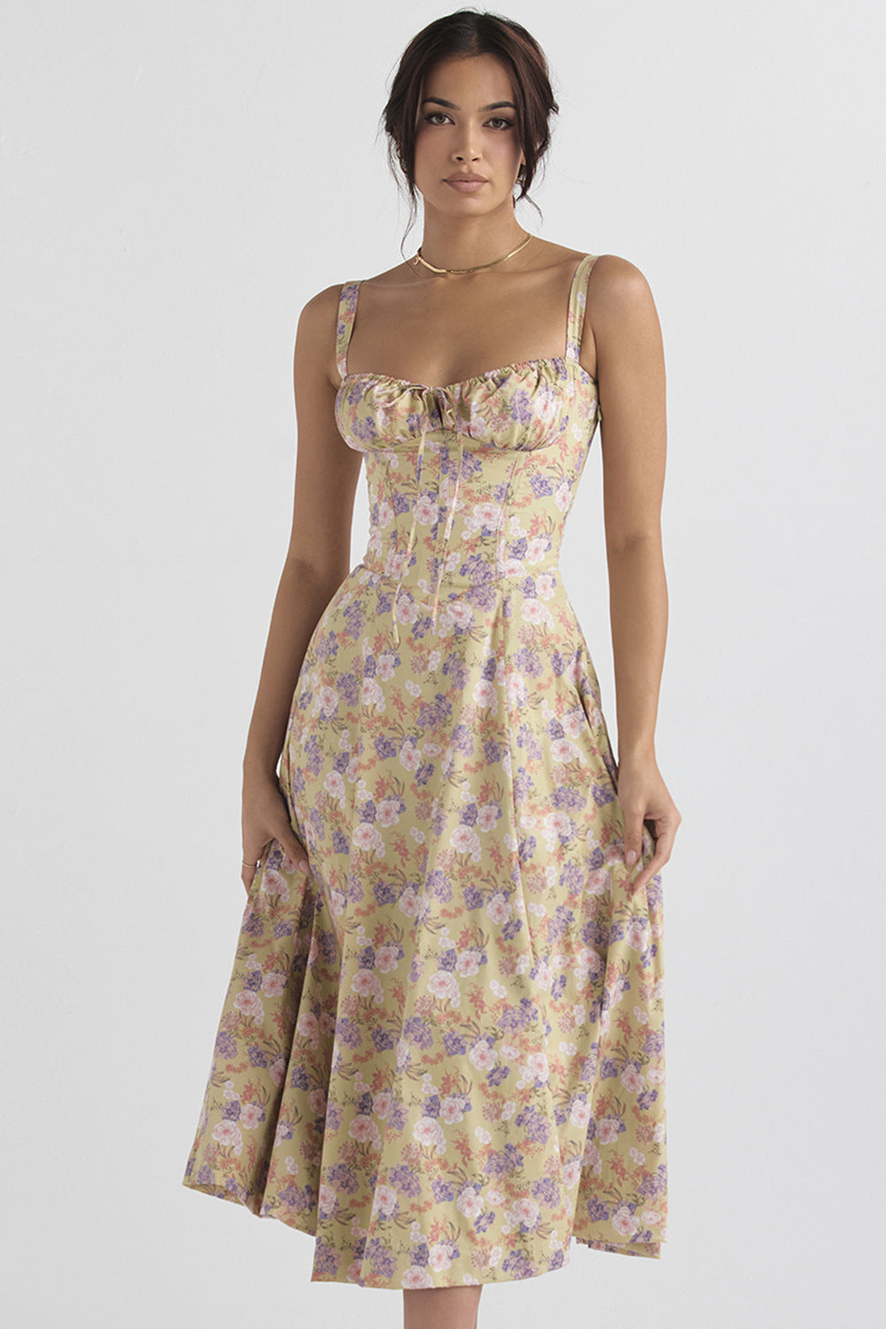 a woman in a floral dress