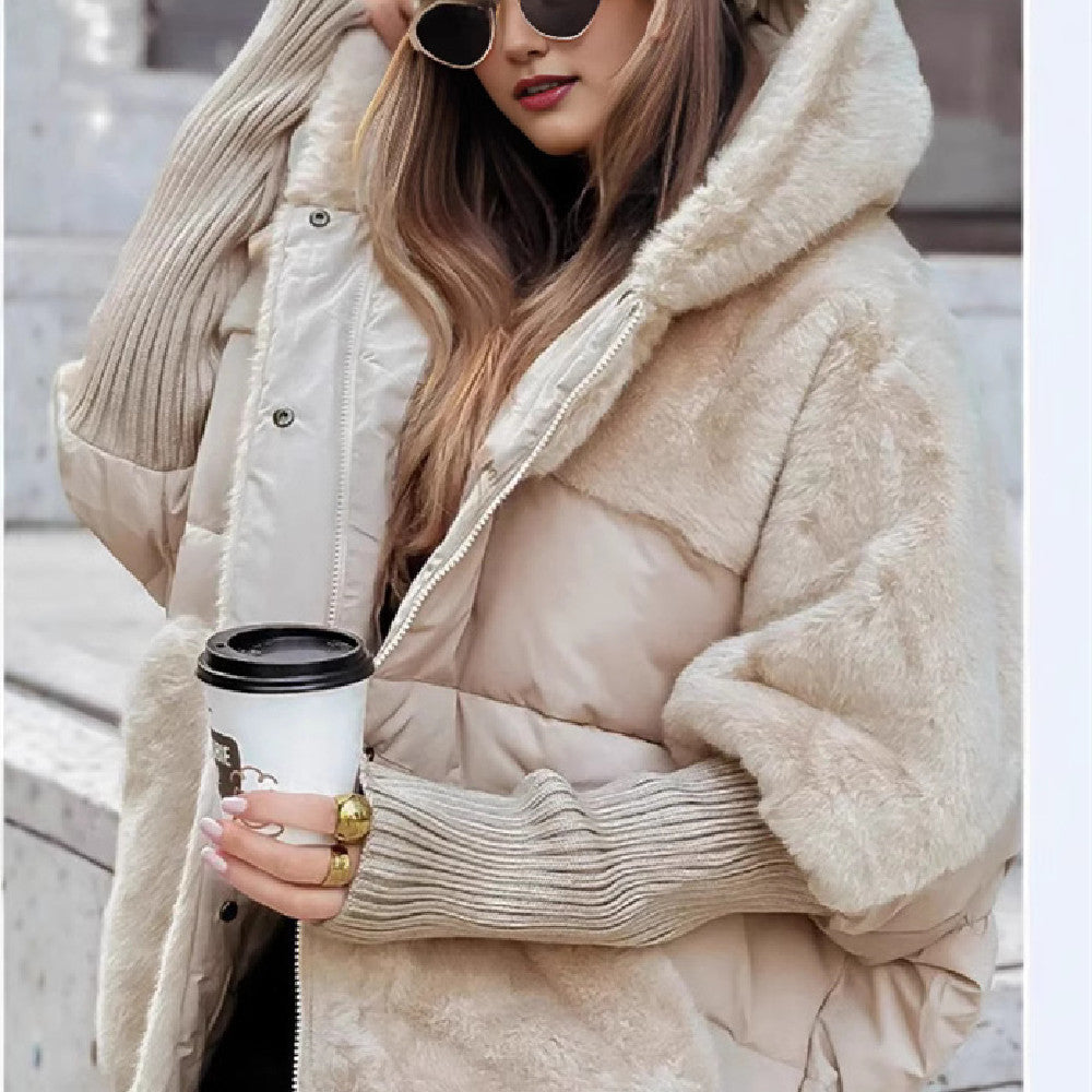a woman wearing sunglasses and a coat