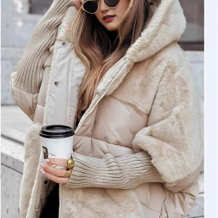 a woman wearing sunglasses and a coat
