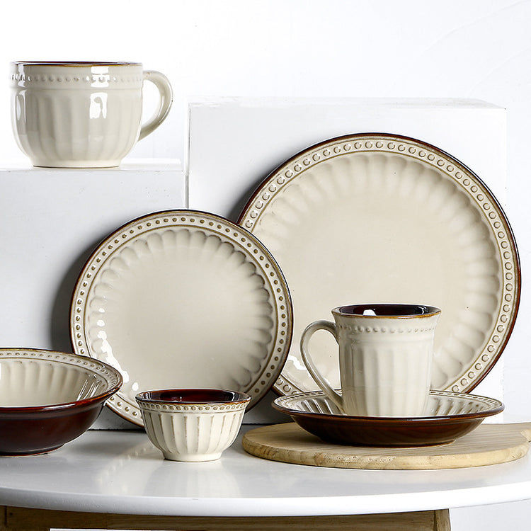 a group of white and brown dishes