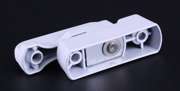 a white plastic object with a hole