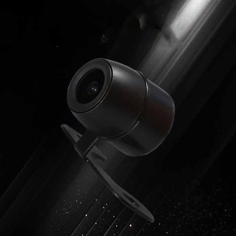 a black camera with a black background