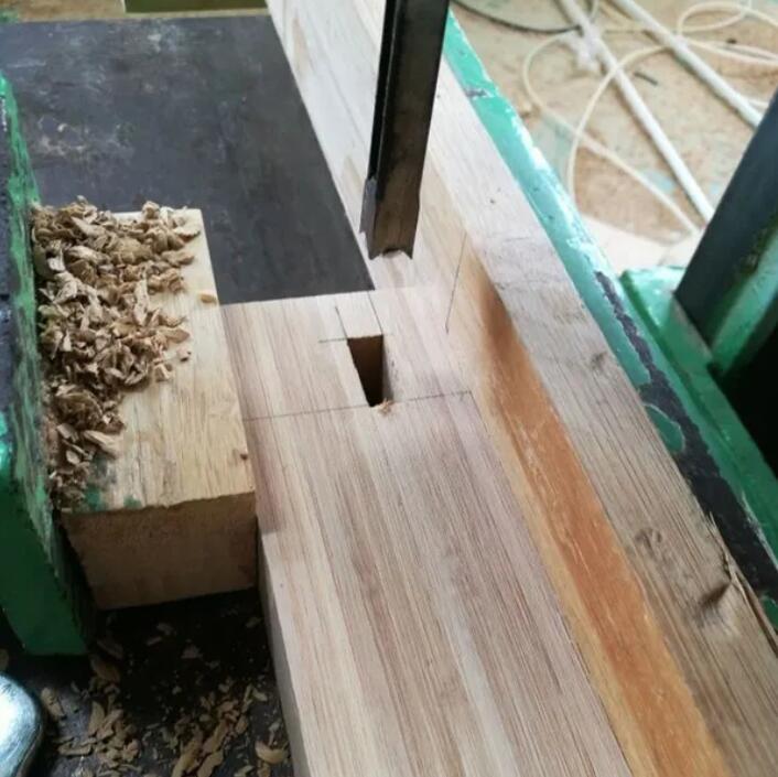 a woodworking machine with a piece of wood