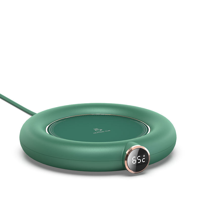 a green circular device with a digital display