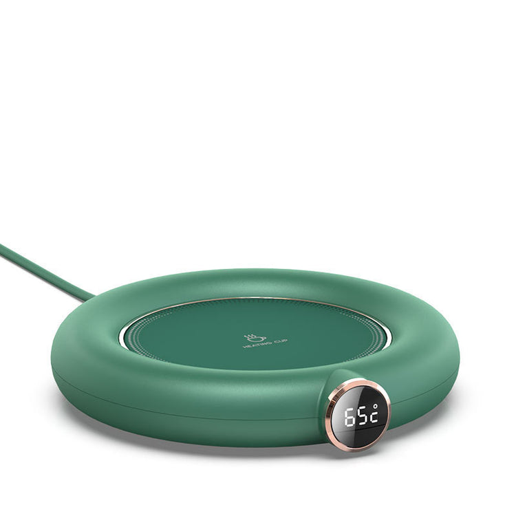 a green circular device with a digital display