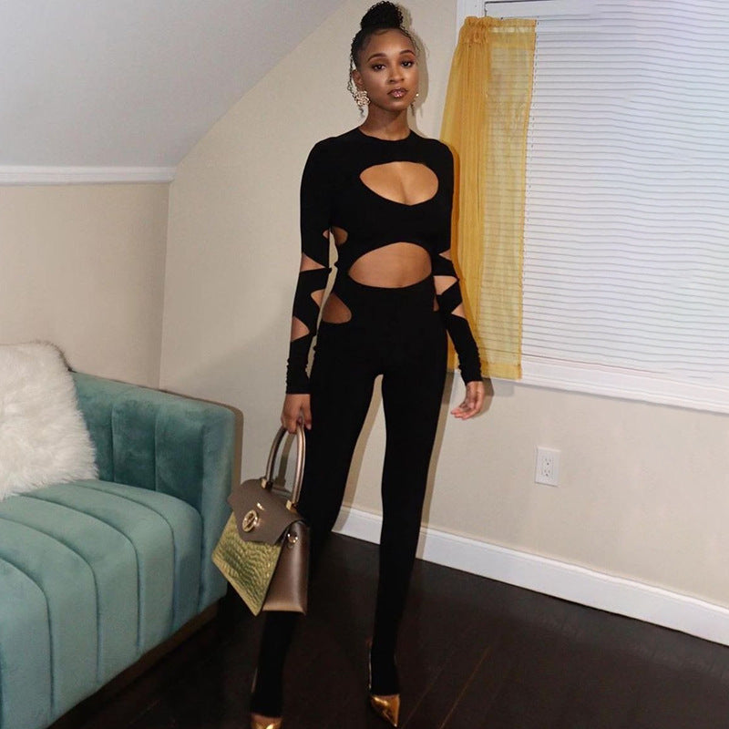 a woman in a black outfit