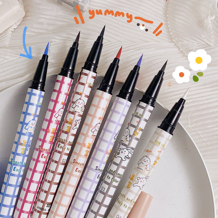 a group of colorful markers on a plate