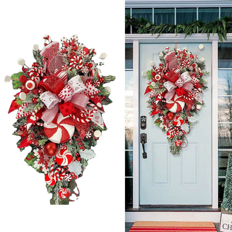 a christmas wreath on a door