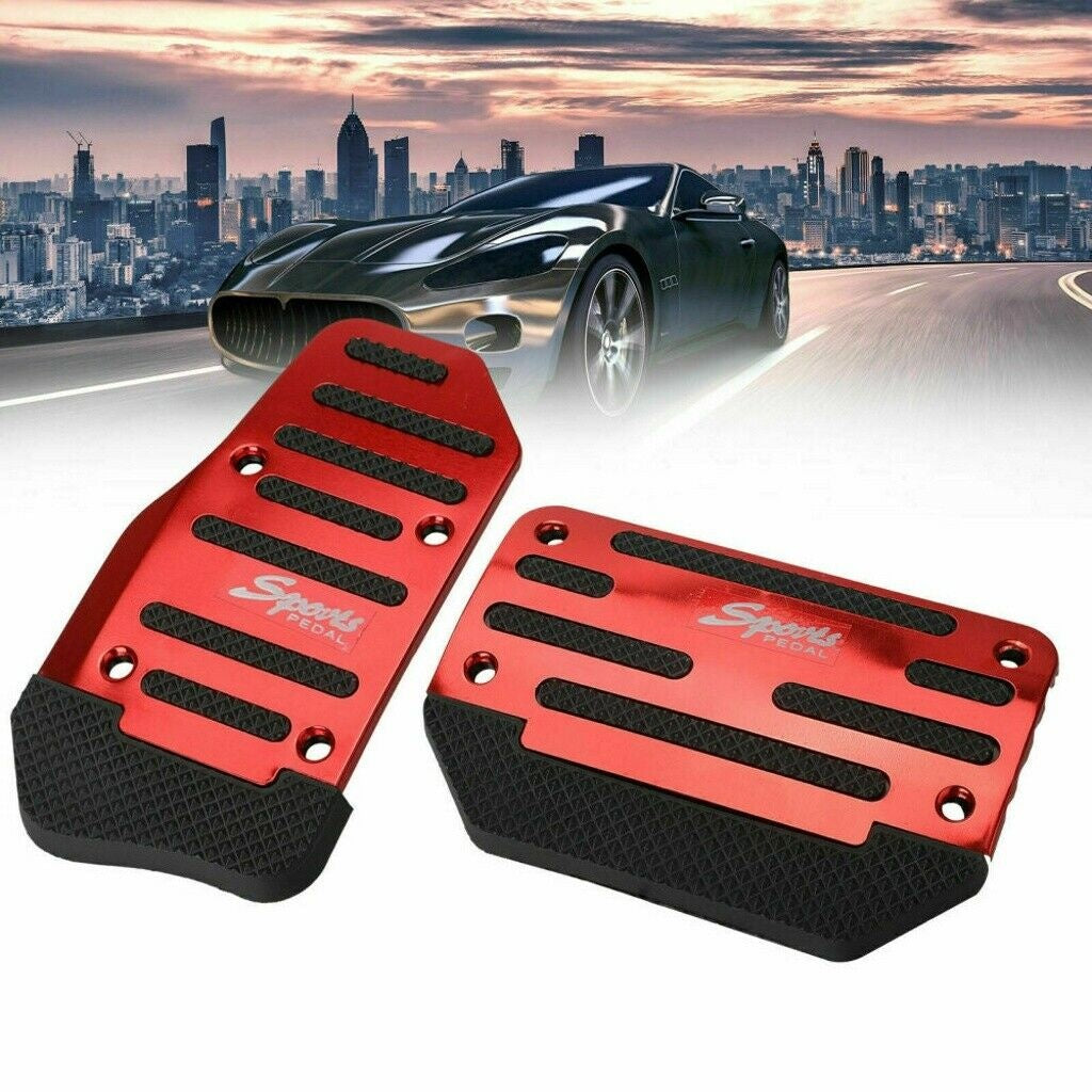 a red pedals on a road with a city in the background