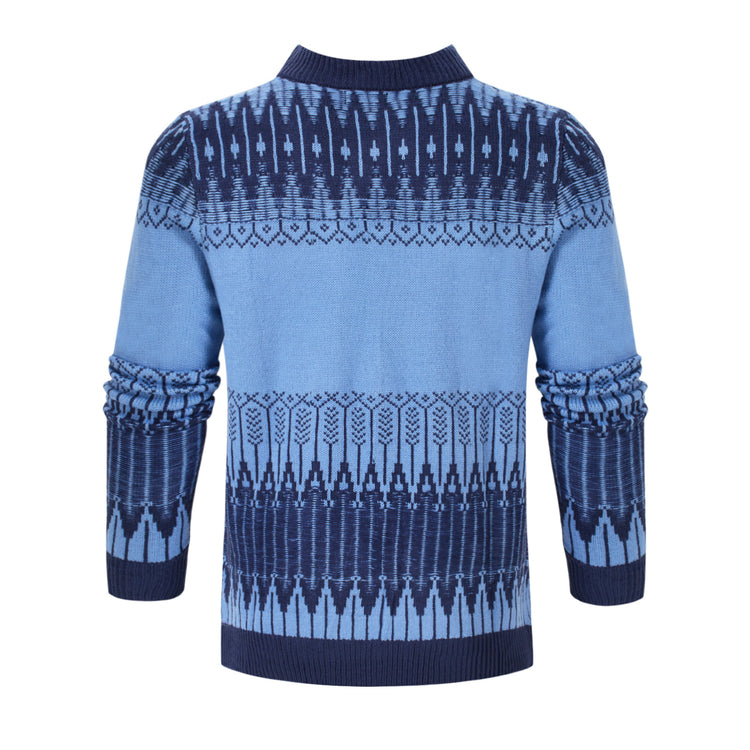 a blue sweater with a pattern on it