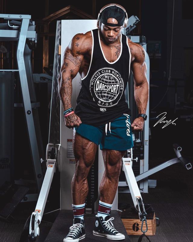 a man standing in a gym