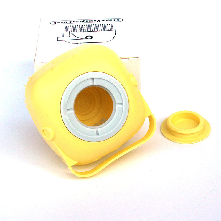 a yellow plastic box with a hole