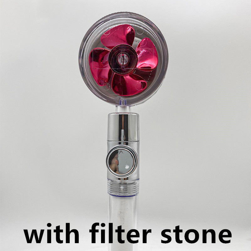 a fan with a red and silver blade