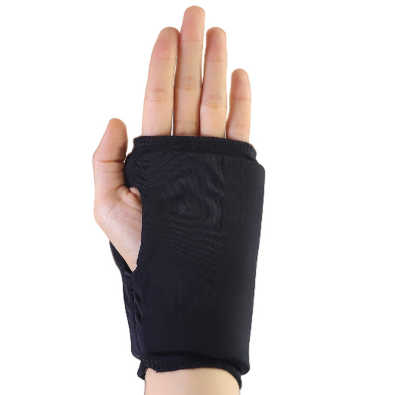 a hand wearing a black glove
