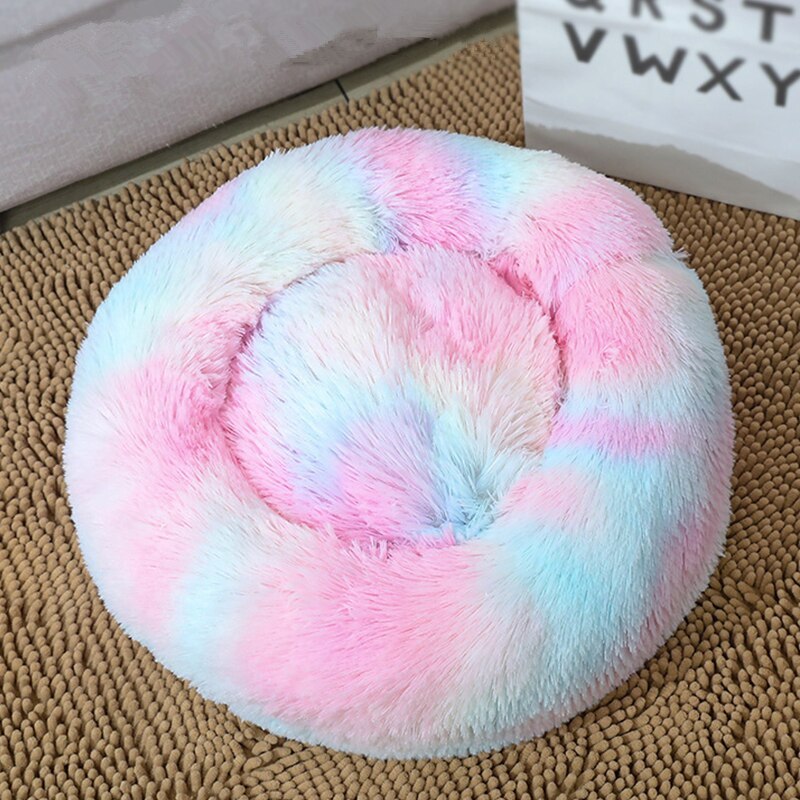 a pink and blue dog bed