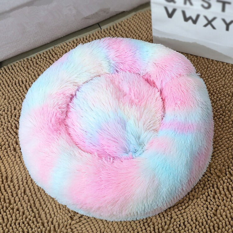 a pink and blue dog bed