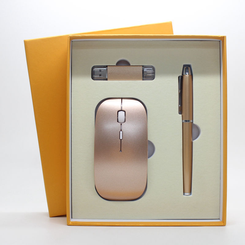 a mouse and pen in a box
