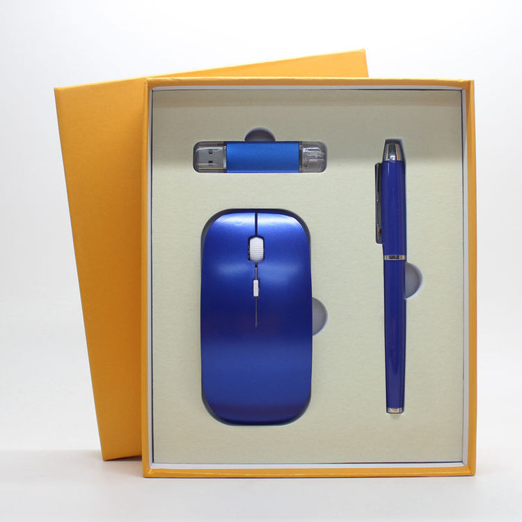 a blue computer mouse and pen in a box