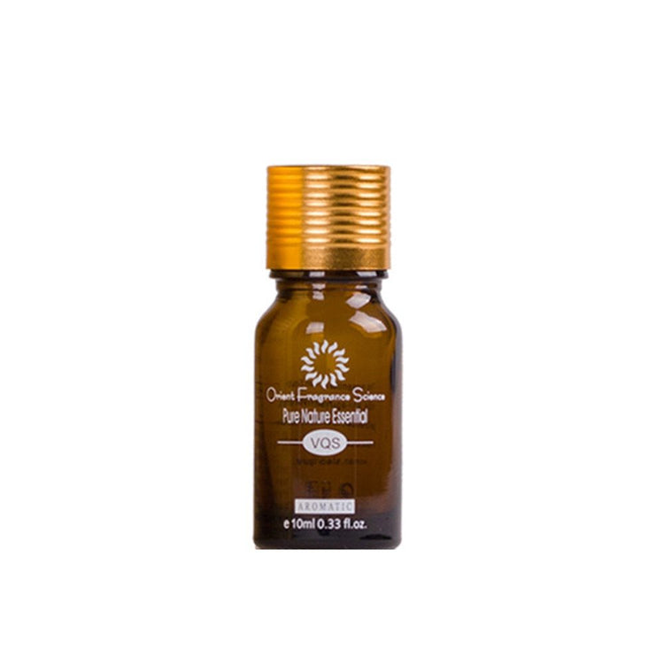 a small brown bottle with a gold cap