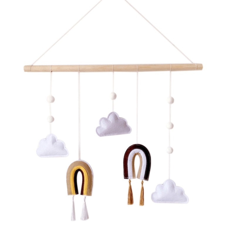 a mobile with rainbows and clouds