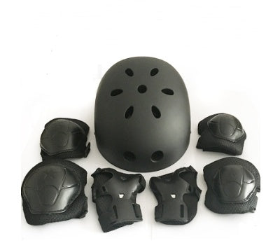 a black helmet and knee pads