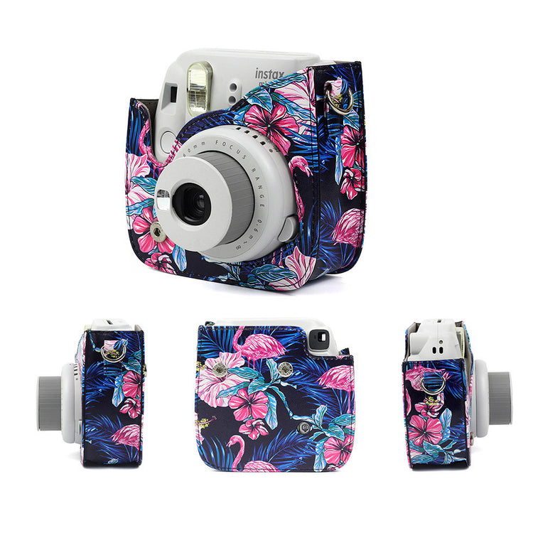 a camera with a floral design