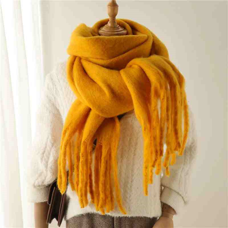 a mannequin wearing a scarf