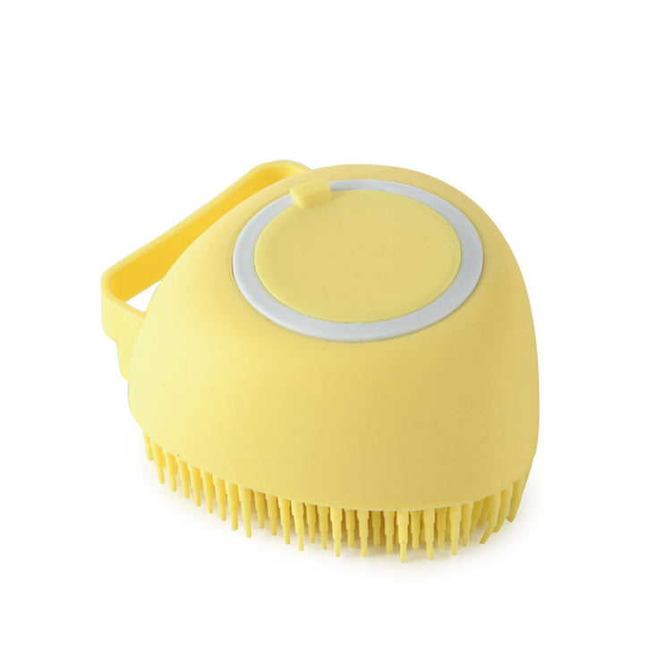 a yellow brush with a handle