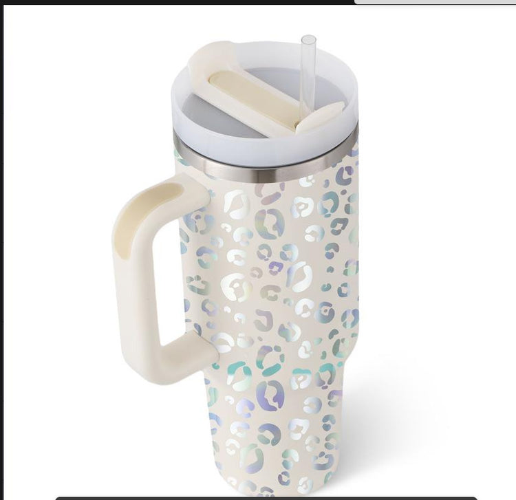 a white and silver coffee mug