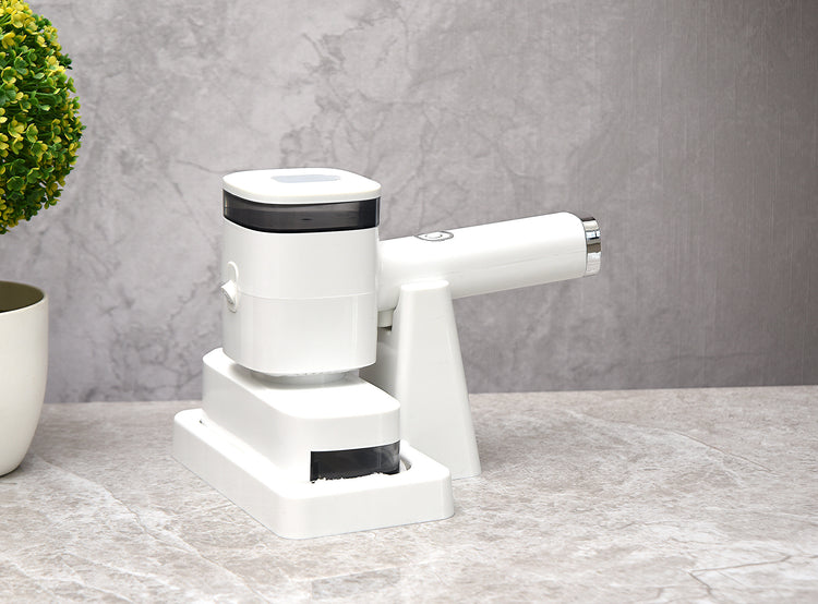 a white device on a marble surface