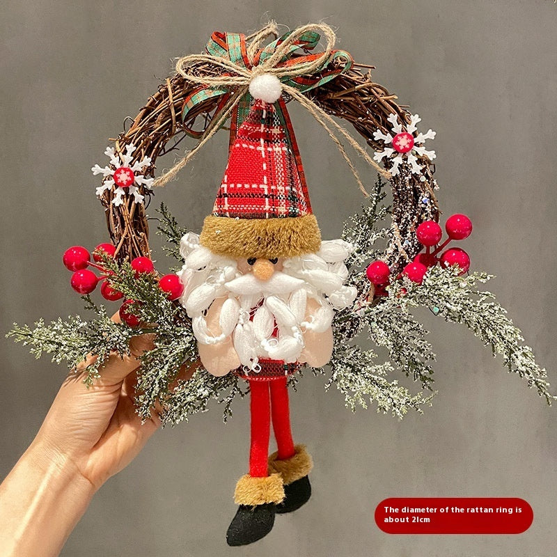 a hand holding a christmas decoration