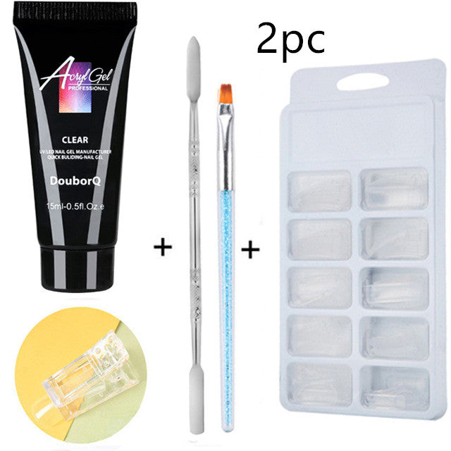 a black tube of gel and a brush