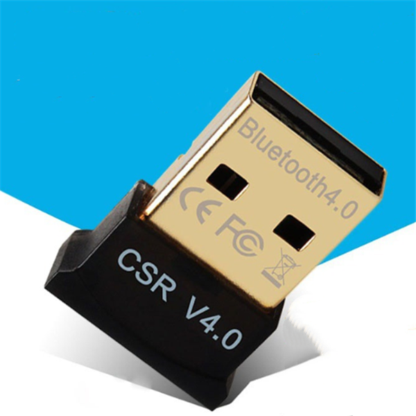 a bluetooth adapter on a white surface